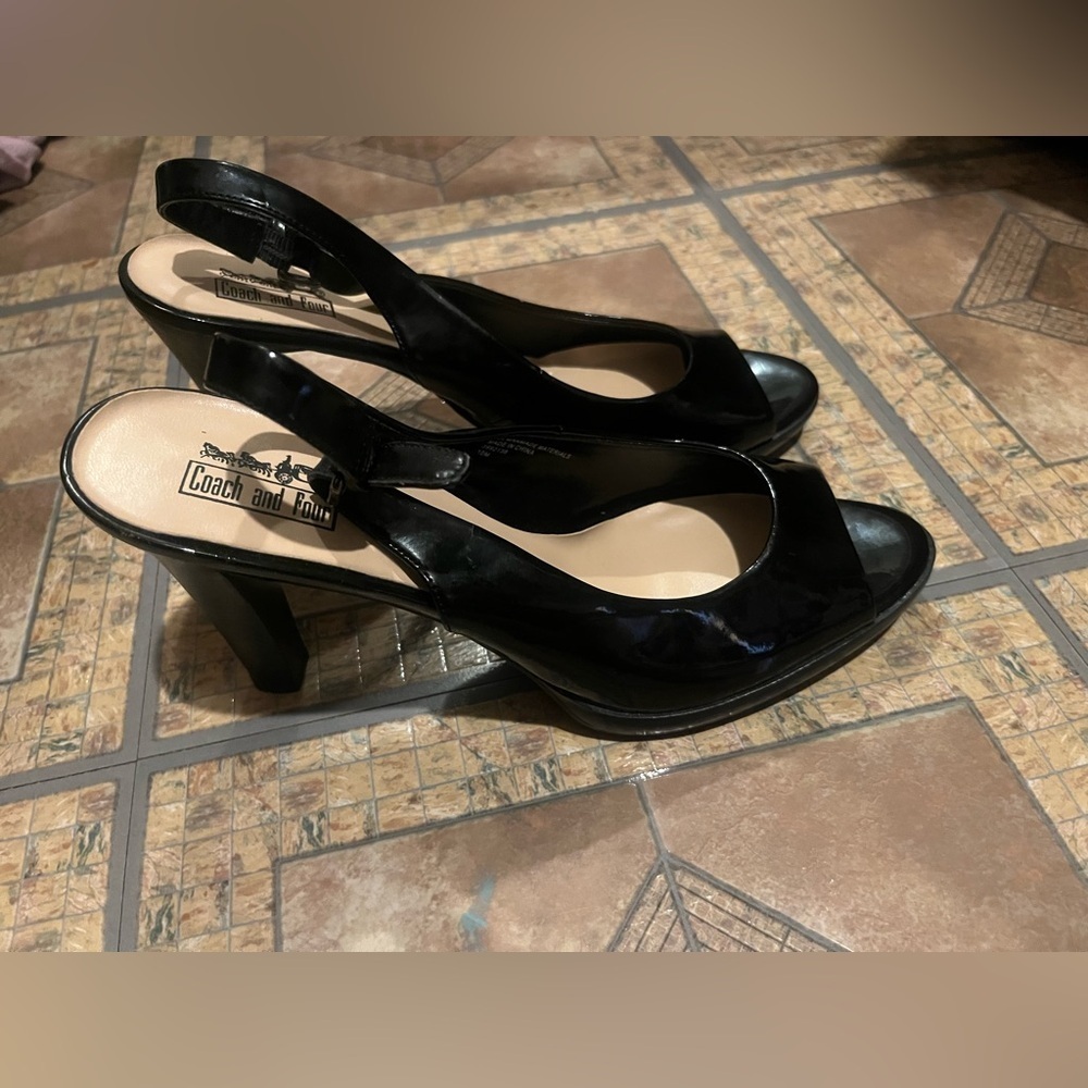 Coach and four Black heels